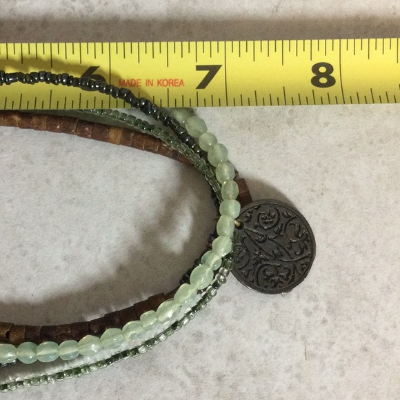 Aura four strand bead necklace with sun moon stars coin pendant - Picture 8 of 8